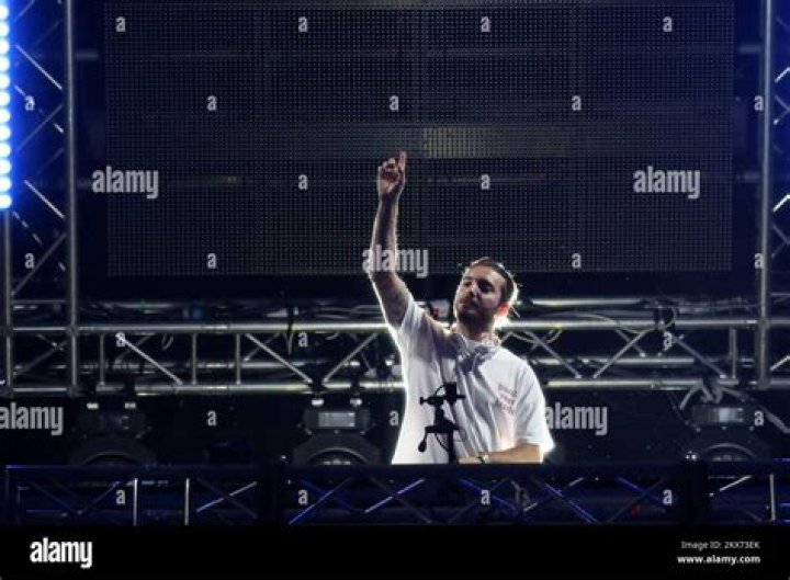Alesso playing on the stage.