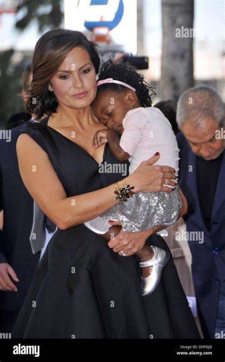 Amaya Josephine Hermann's parents, Mariska Hargitay and Peter Hermann, together in each other's arms.