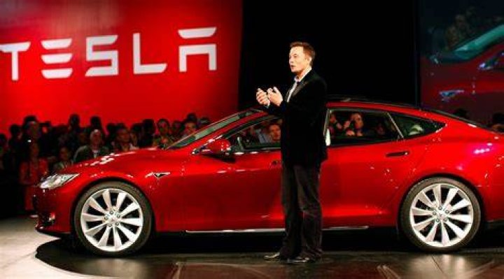 Elon Musk at Tesla's gas station.