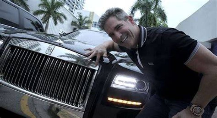 Grant Cardone With his Rolls Royce