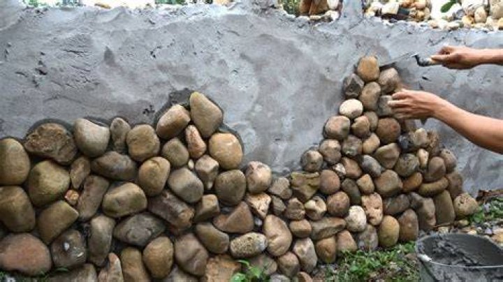 How do you build a river stone wall?