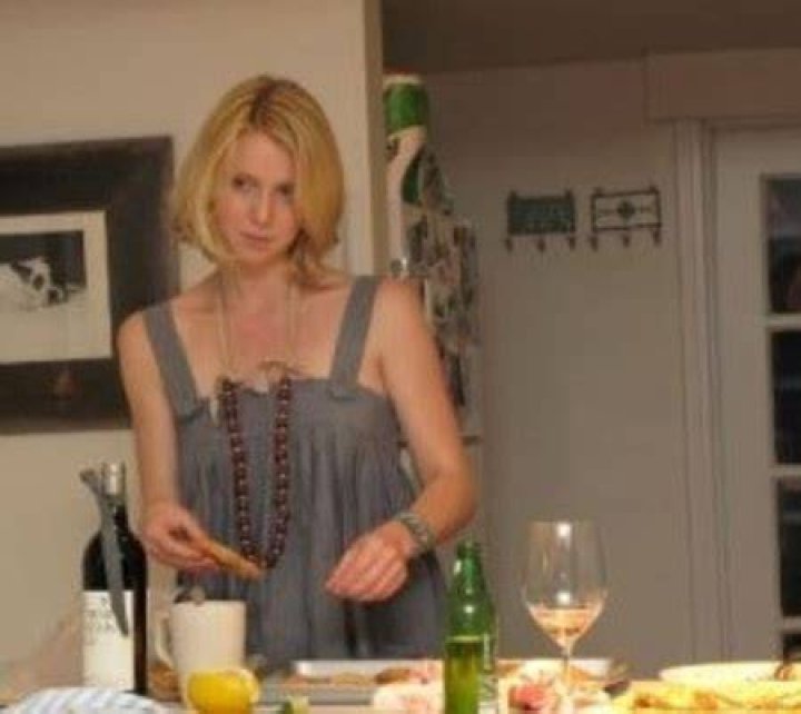 Lilly making and enjoying her dinner