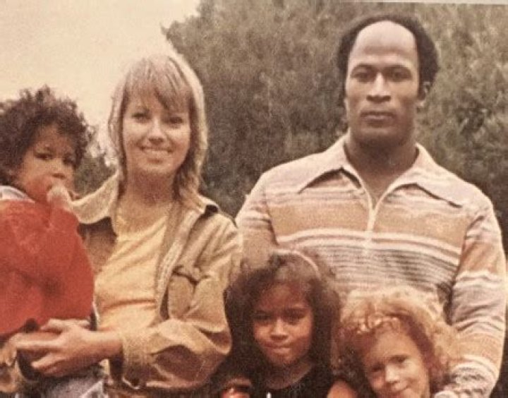  Noel J. Mickelson with her former husband, John Amos posing for a photo shoot.