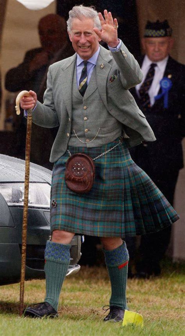 Prince Charles In Kilt And Sporran And Shepherd's Crook Walking Stick With Prince William & Prince Harry At Polvier, By The River Dee, Balmoral...