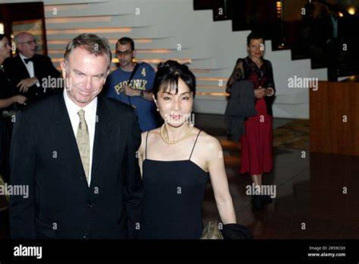 Sam and Noriko wear a matching black outfits