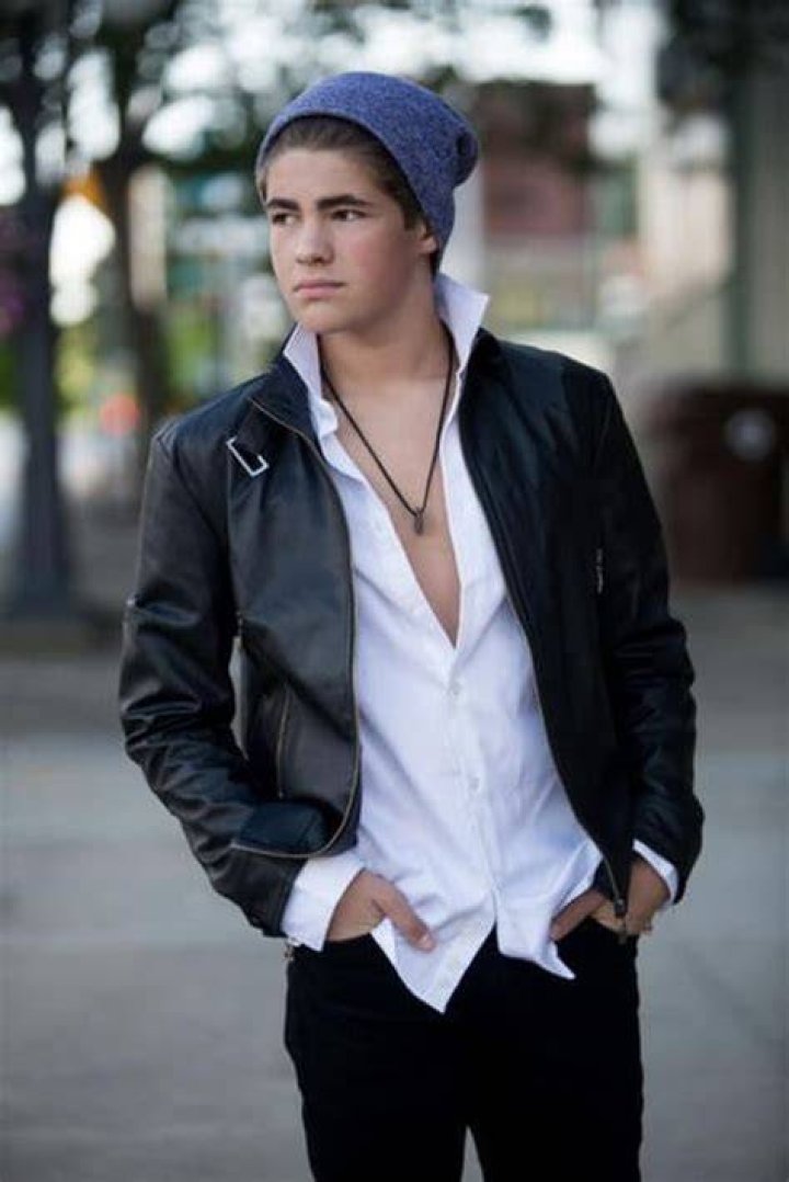 Skyler Guthrie posing for a photo by putting his both hand in his pocket.