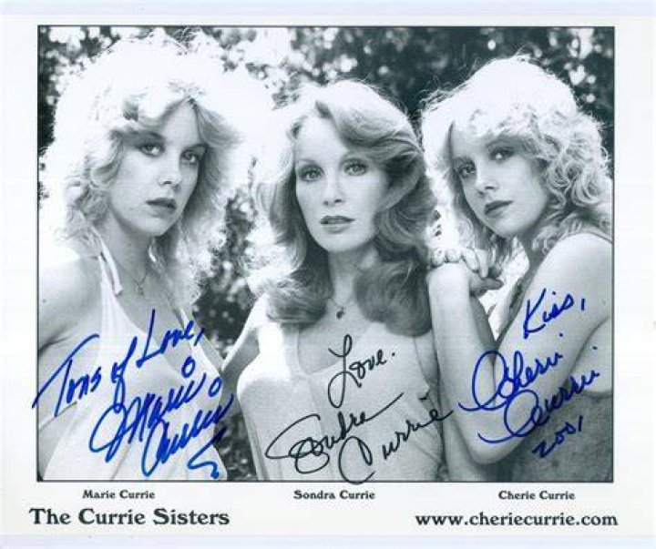 Sondra Currie with her twin sisters Cherie Currie and Marie Currie.