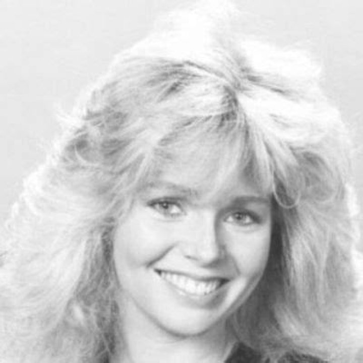Susan Dee Robbins posing for an photo shoot. 