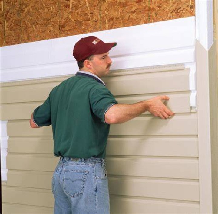 What is behind vinyl siding?